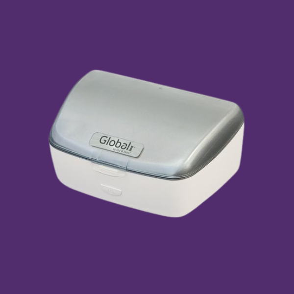 White plastic container with a rounded silver lid, branded 'Global' on the lid, set against a purple background.